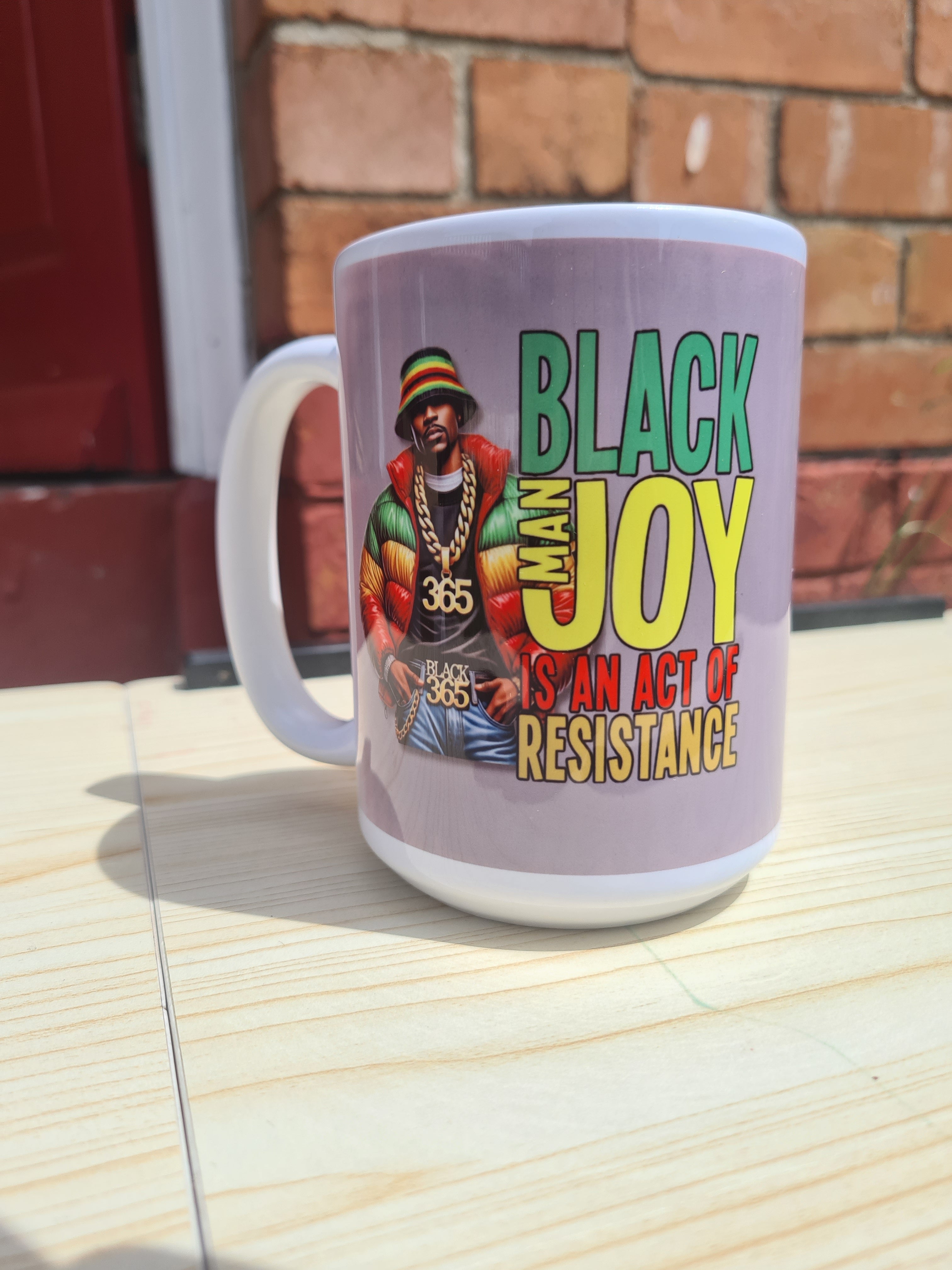 Black Man Joy Is an Act of Resistance Ceramic Mug