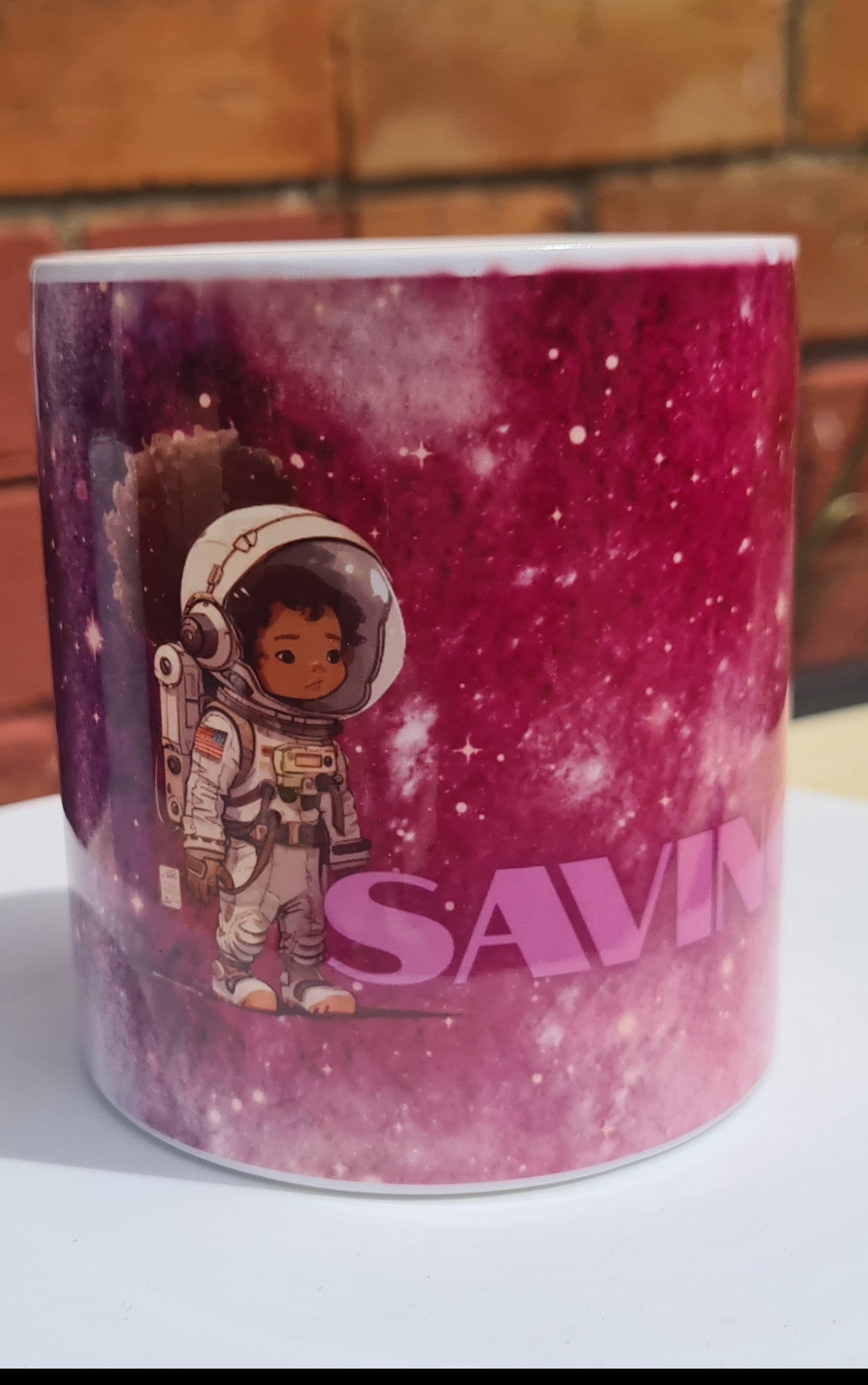 A customised money box space scene with girly astronought